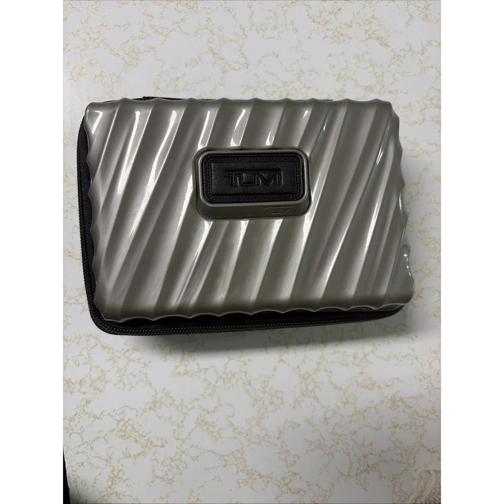 TUMI For Delta Silver Gray Hard Shell Cosmetic Toiletries Zip Travel Case